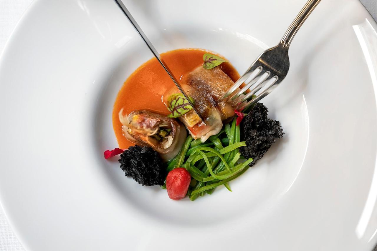 Baglioni Hotel Regina - The Leading Hotels Of The World Roma Esterno foto A plate of food